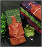 Load image into Gallery viewer, Green semi silk saree with zari border , Traditional green saree for festive events , Soft silk green color saree with blouse , Graceful green saree for wedding wear , Emerald green zari woven saree , Leaf green saree with soft fabric , Green color ethnic silk saree , Light green saree with zari detailing . 
