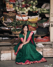 Green Cotton Lichi Half Saree / Langa Voni and Dhavani Set With Price and Online Shopping Price Under 1500 . This Fabric Soft Lichi Silk and Smooth Fabric . This Fabric  Cotton Lichi Green and Rani Border With Zari Weaving Work. THis Dhavani Set , Half-Saree Party and Any Occasions...