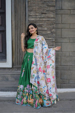 Load image into Gallery viewer, Green Color With White Dupatta Dola Silk Dhavani Set , Langa Voni , Davani Set and half-Sarees With Price and Online Shopping Price 2000 . Enhance your elegance with this Dola Silk Designer Lehenga Set. Featuring rich prints, embroidered blouse, and a stylish dupatta with tassels, it’s perfect for festive and wedding occasions. Available in Pink and Green 
