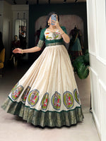 Load image into Gallery viewer, Green Koti With Cream Color Dola Silk Gown Price and Online Shopping Price Under 1500 . Elevate your festive look with a stunning Dola Silk gown and Zari weaving koti. Perfect for weddings, parties, and celebrations!
