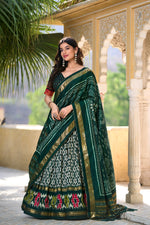 Load image into Gallery viewer, Green Tussar Silk Dhavani Set, Langa Voni , Half-Saree and Langa Voni With Price and Online Shopping Price Under 2000 . This Fabric Soft and Premium Fabric . This Green Tussar Silk Lehenga Rajavadi Pattern With Ikkat Print With Foil Work This Lehenga Working Traditional Look For 2024-25 . This Lehenga Price Under 2000 .  
