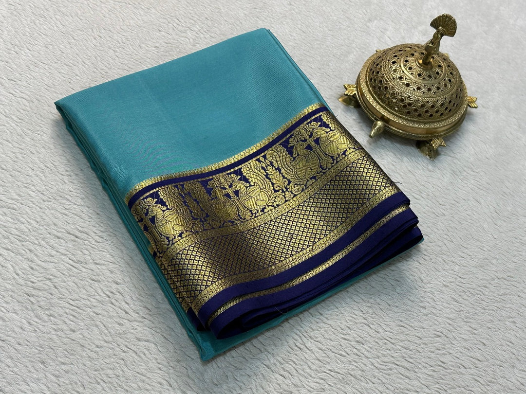 Light Blue Pure Semi Mysore Silk  Sarees with Price and Soft Silk Saree Online Shopping Price 1000 . this fabric rich and Pure Semi Mysore Silk Saree and border Fully Zari Weaving Work Same Color  and price under 1000 . Traditional Look For 2024-25 , 2025-26 . 
