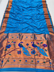 Light Blue Pure Soft Silk Sarees price 2000 . this Fabric Pure Soft Silk for weddings and Smooth Softness Fabric in this price under 2000 .