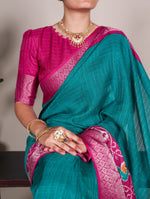Load image into Gallery viewer, Light Blue Tussar Checks Saree With Price and Online Shopping Price Under   1000 . Upgrade your wardrobe with this Tussar Chex saree. Beautiful Patola print with weaving work border and an unstitched blouse piece. Perfect for festive occasions. Traditional Look For 2025-2026 . 
