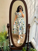 Load image into Gallery viewer, Light Blue With Multicolor Soft Muslin Dress With Price and Online Shopping Price Under 1000 . Experience comfort and charm with this Soft Muslin Dress. Designed with beautiful prints, short sleeves, and complete lining, it’s available in stunning Pink white and Light Blue White shades.
