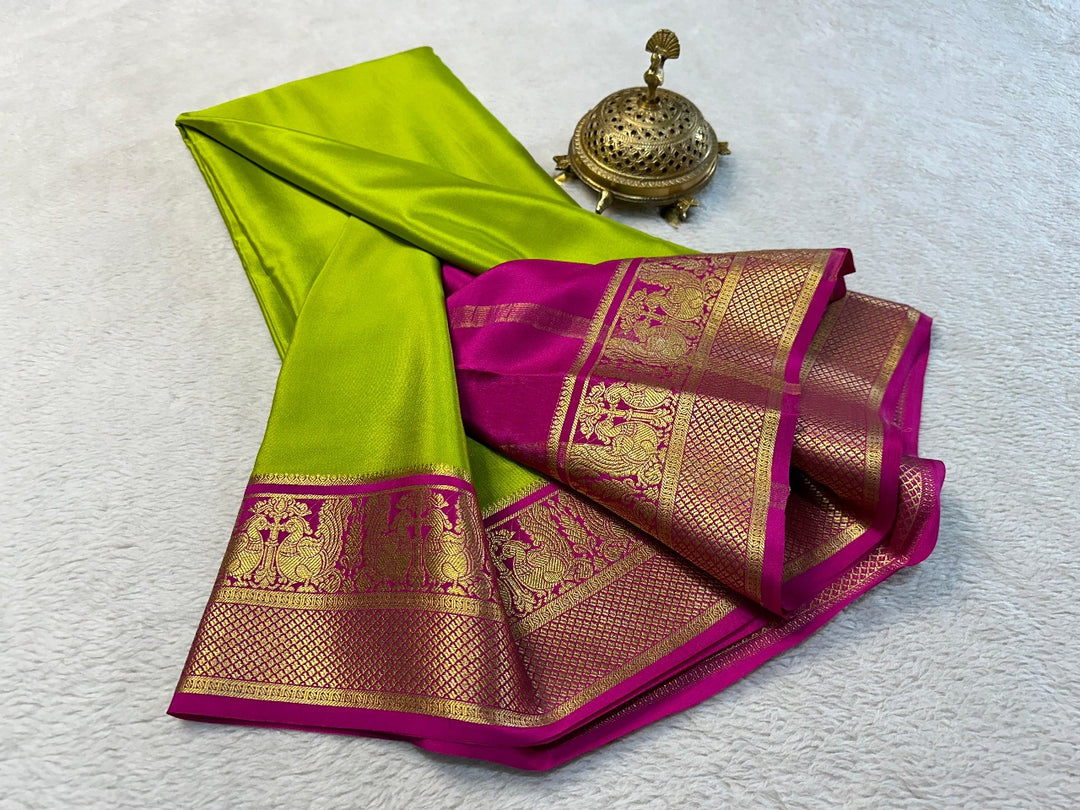 Elegant Semi-Mysore Silk Saree featuring Zari weaving. 6.3m length with matching blouse piece. Machine washable. Perfect for Pongal celebrations.
