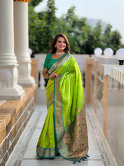 Light Green Soft Pethani Silk Sarees With Price and Online Shopping Price under 2000 . This Saree Most Beautiful Look and Soft Smooth Fabric and Rich Pallu and Gold Zari Weaving Work . 