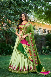 Light Green With Green Tussar Silk Dhavani Set , Davani Set and Half-Saree With Price and Online Shopping Price Under 2500 . This Printed With Foil Print Dhavani Set features foil printing and a drawstring with heavy tassels and zip. The set also includes a stitched canvas and attached Can , an stitched blouse with foil printing, a Dupatta, and Printed With Both Side Tassels . 
