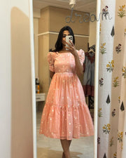 Light Orange Maska Cotton With Price and Online Shopping Price Under 1000 . this Fabric For Wedding Special Price Under 1000 .  Step out in style with this Maska Cotton Embroidery Work  Dress. Crafted with lightweight, breathable fabric and a flattering 3.5-meter flare, it’s ideal for casual and festive occasions.