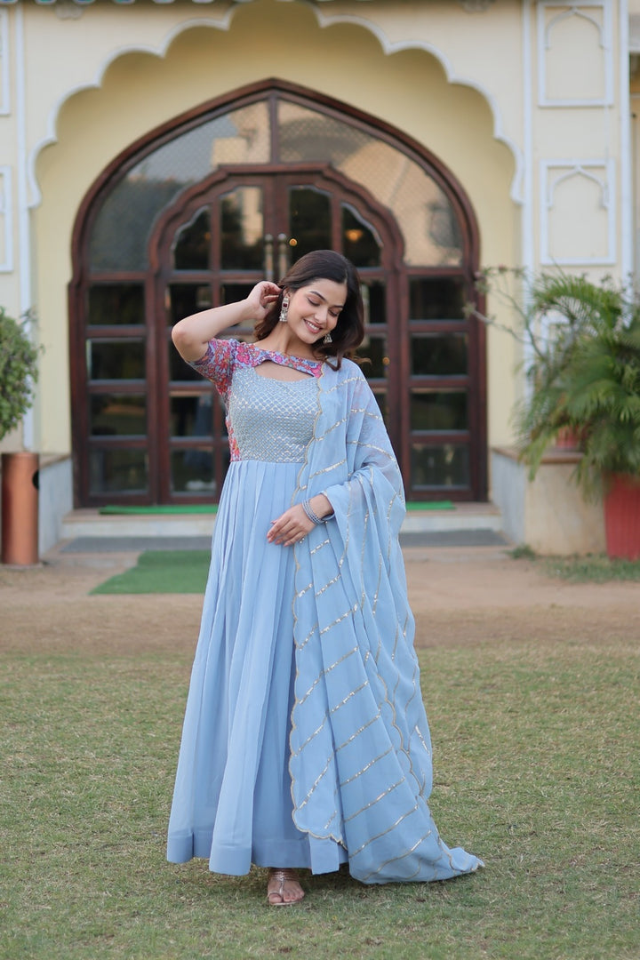 Light Sky Color Faux Georgette Anarkali With Price and Online Shopping Price Under 2000 . Step into elegance with this Faux Georgette and Dupatta set. Featuring intricate Rich Floral Position Print work, a padded design, and four rich shade Light Sky color.
