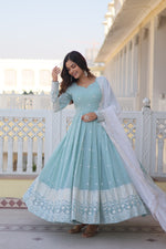 Load image into Gallery viewer, Light Sky Faux Georgette Sky Anarkali With Price and Online Shopping  Price Under 2000 . This Fabric So Heavy Sequence Work and Graceful Anarkali-style gown in Faux Georgette With 3.5-meter flair, Zari embroidery, and V-neck. Paired with a 2.3-meter designer dupatta with lace detailing.
