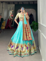 Load image into Gallery viewer, Light Sky Jacquard Silk ( Paithani ) Dhavani Set , Half-Saree , Langa Voni and Davani Set With Price and Online Shopping Price Under 3000 . Step into elegance with this Light Sky Jacquard Silk Paithani Lehenga Set. Adorned with intricate Zari Weaving Work, a stunning 3.5-meter flair, and a graceful Dupatta with tassels, this set includes a Batwa, making it an ideal choice for festive celebrations and traditional gatherings.
