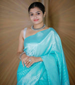 Load image into Gallery viewer, Light Sky Lichi Silk Saree price online shopping under 1000 . 
This Color Lichi Silk Saree With Gold Zari Weaving Work and Jacquard Work For Weddings and So look Mainly . This Fabric Weddings Special Zari Weaving Work and Party Wear Collection . Traditional Look 2024-25 .  
