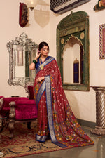 Load image into Gallery viewer, Maroon silk saree with golden border

Bridal maroon saree for wedding

Maroon saree with zari weaving

Pure maroon handloom cotton saree

Maroon georgette saree with sequins

Maroon saree with designer blouse

Maroon saree for festivals and pujas

Elegant maroon saree under ₹1500

Maroon lehenga saree for bride

Dark maroon traditional saree


