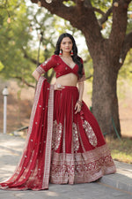 Load image into Gallery viewer, Elevate your traditional look with this Maroon Faux Blooming Georgette Lehenga. Complete with intricate sequins embroidery, a flattering 3.5-meter flair, and a matching dupatta, it’s elegance personified . Traditional Looks 2024-25 . 
