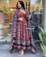 Load image into Gallery viewer, Maroon Heavy Cotton Maroon Anarkali With Price and Online Best Choise Shopping Price Under 2000 . Premium Heavy Cotton gown featuring  prints and a 3.80-meter flair. Styled with a dupatta Heavy Block Full and tassels for a refined look.
