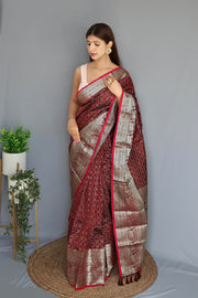 Maroon Silk Sarees With Price Under 2000 . This Fabric Silk Saree For Weddings Specials and Rich Pallu and Silver Zari Weaving Work With Jumka Design Most Authentic Look Tradition Look 2024-2025 . 