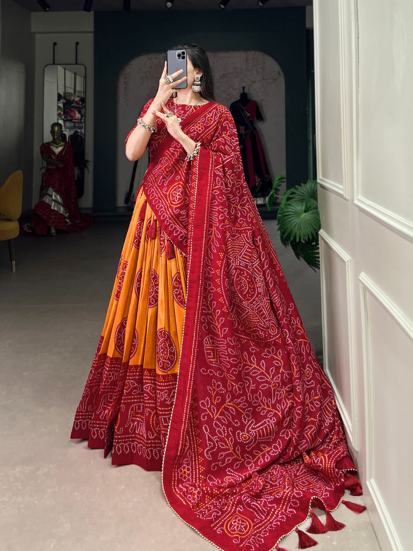 Maroon Tussar Silk Dhavani Set, Langa Voni , Half-Saree and Langa Voni With Price and Online Shopping Price Under 2000 . This Fabric Soft and Premium Fabric . This Green Tussar Silk Lehenga Rajavadi Pattern With Bandhej Print
 This Lehenga Working Traditional Look For 2024-25 . This Lehenga Price Under 2000 .  