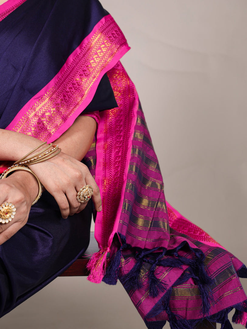 Navy zari weaving saree with premium feel , Beautiful navy silk saree with shimmer and shine , Navy color saree for sangeet and puja look , Deep navy saree with woven golden zari border , Aura silk saree in bold navy tone . 
