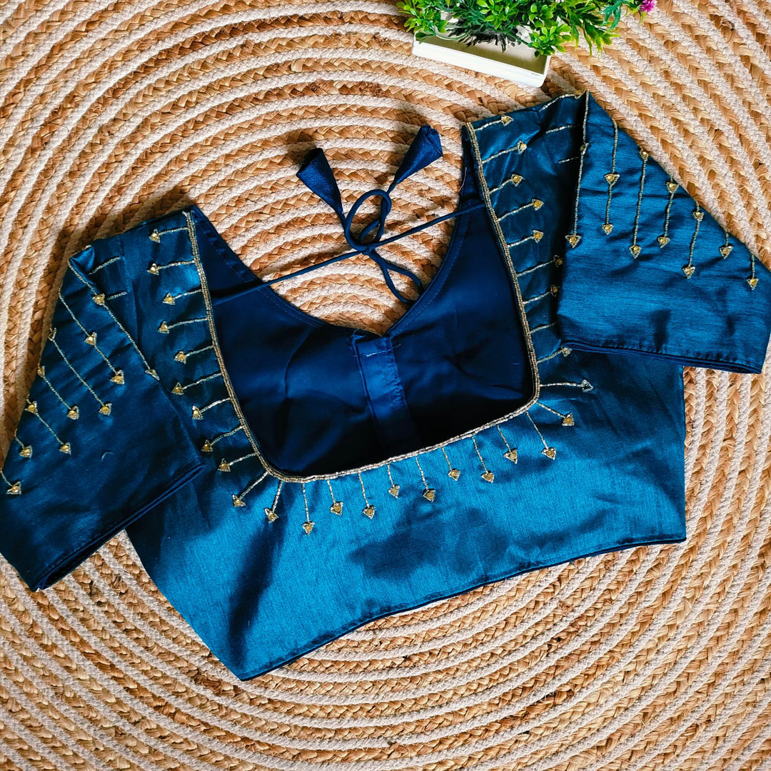 Navy Color Or Blue Color Reshm Silk Stitched Blouses With Price and Online Shopping Price Under 1000 . this Fabric Embroidery work and back Pith Square ,  it drapes beautifully and adds a touch of grace to the overall ensemble, perfect for elevating your outfit for any occasion.