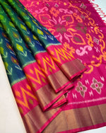 Load image into Gallery viewer, Navy Ikkat Saree dola silk sarees with price and online price 1000 . this fabric Mainly Manufacturing in Telangana in India.
