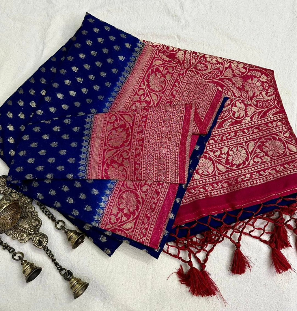 Navy Viscose Silk Saree featuring elegant Zari weaving. Includes 6.3m saree with matching blouse piece. Machine washable for easy maintenance.
