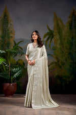 Load image into Gallery viewer, Off-White Kanjivaram With Zari Weaving Work Sarees For Best Weddings Price and Online Shopping Price Under 1500 . This Fabric SO Heavy Zari Weaving Work Graceful purple Kanjivaram saree adorned with intricate zari weaving work. Includes a matching blouse piece. Perfect for festive occasions and weddings.
