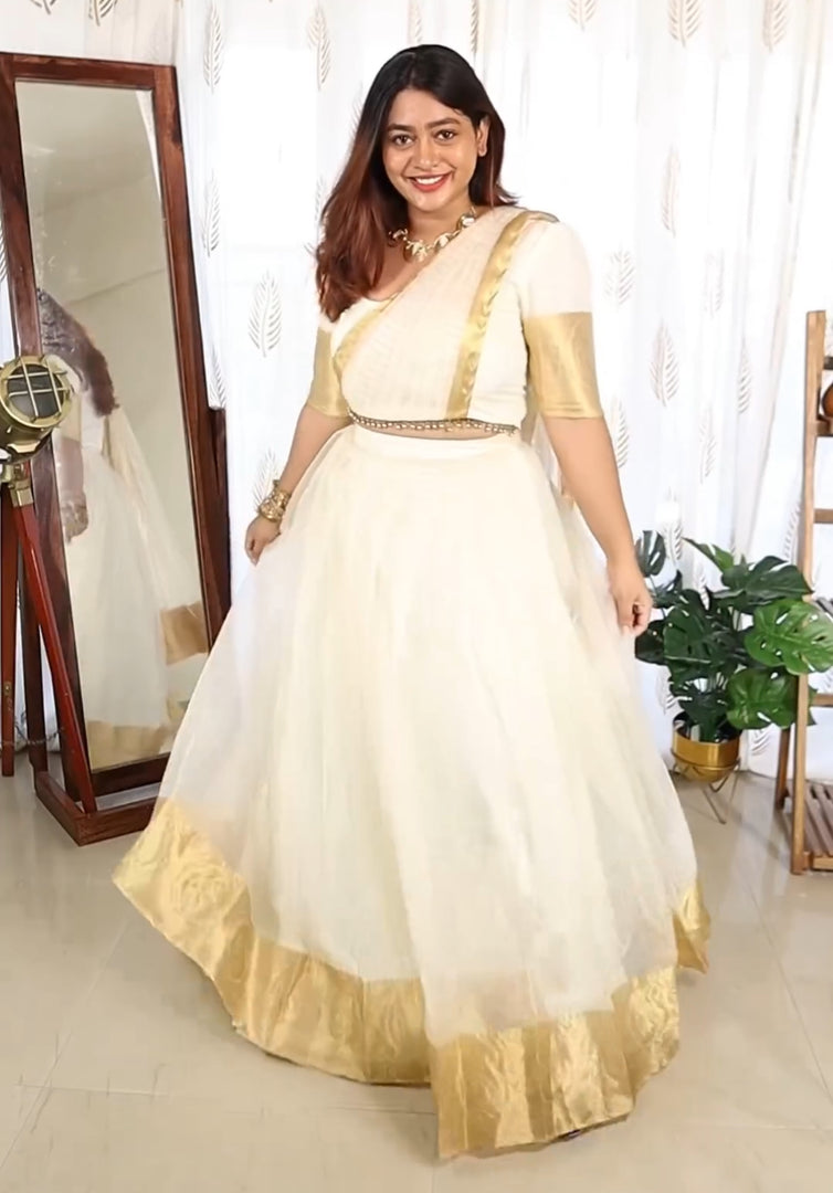 Lehenga - stitched Zari Organza with jacquard, zip attached, COLOUR - single, blouse - stitched Organza Zari, SIZE - XS - XXL, Flair - 5 m and up, Colors - 4 available, Liner - full inside, Dupatta- Organza with lace, LENGTH - 2 m and up, Work - original Zari pattu work.
