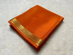 Load image into Gallery viewer, Vibrant orange silk saree with golden zari , Orange cotton saree with temple border , Soft orange georgette saree with sequin work , 
Orange Mysore silk saree with contrast blouse , Designer orange saree with printed pallu , Bright orange organza saree with lace trim , Festive orange saree with  embroidery highlights , Lightweight orange saree for daily and party wear , Orange Banarasi saree with traditional motifs , Elegant orange saree with mirror work border . 
