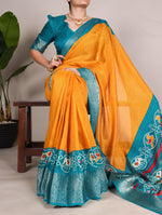 Load image into Gallery viewer, Orange With Light Blue Tussar Checks Saree With Price and Online Shopping Price Under 1000 . this fabric Shop premium Tussar Chex sarees with Patola print, weaving work borders, and matching blouse fabric. Saree length: 5.5 meters, blouse: 0.80 meters. Traditional Woman Saree Model Look 2025-26 . 
