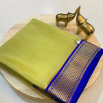 Load image into Gallery viewer, Elegant Parrot Color Semi-Mysore Silk Saree featuring Zari weaving. Includes matching blouse piece. 6.3m length , Pure Semi Mysore Silk Saree Price and Online Shopping Price 899.


