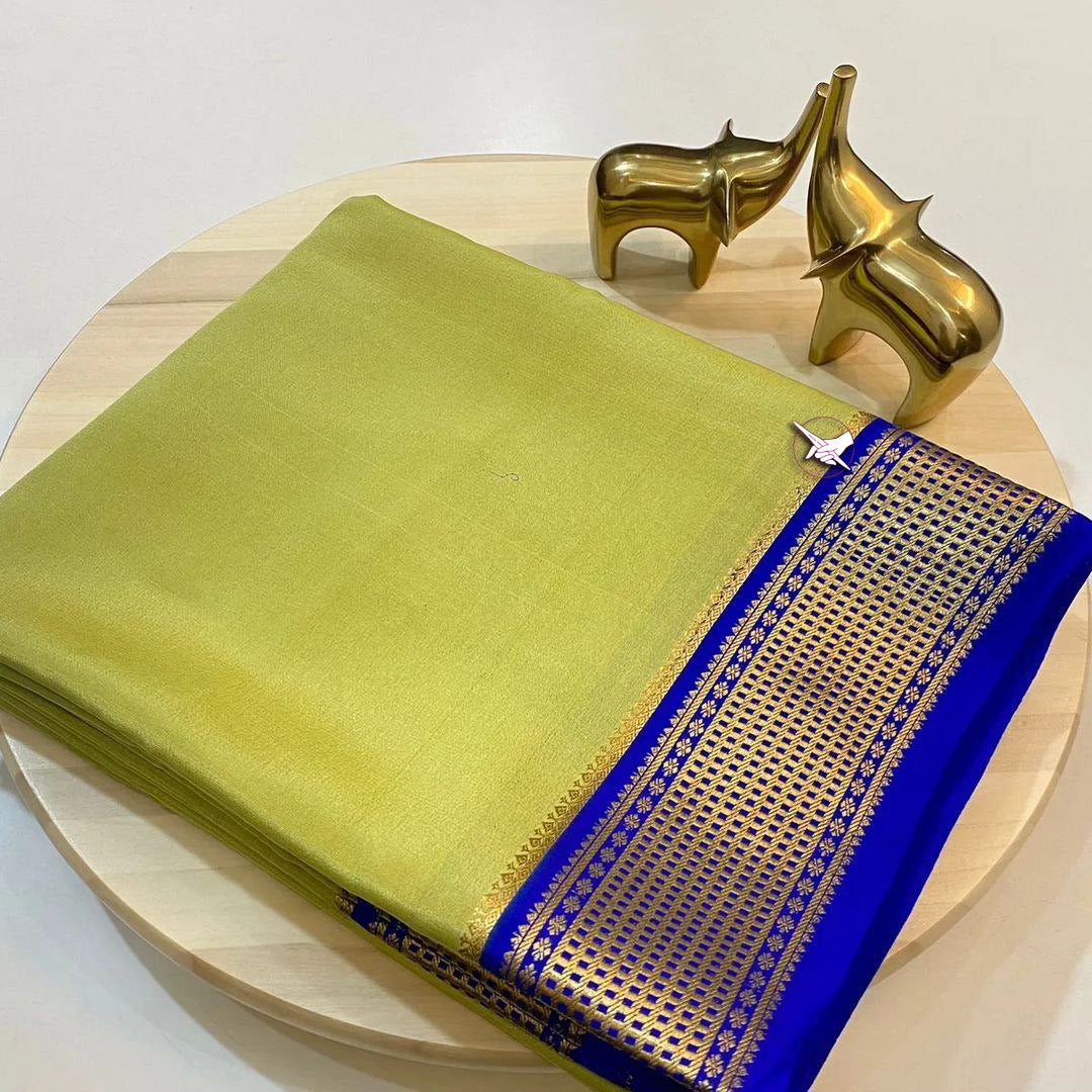 Elegant Parrot Color Semi-Mysore Silk Saree featuring Zari weaving. Includes matching blouse piece. 6.3m length , Pure Semi Mysore Silk Saree Price and Online Shopping Price 899.
