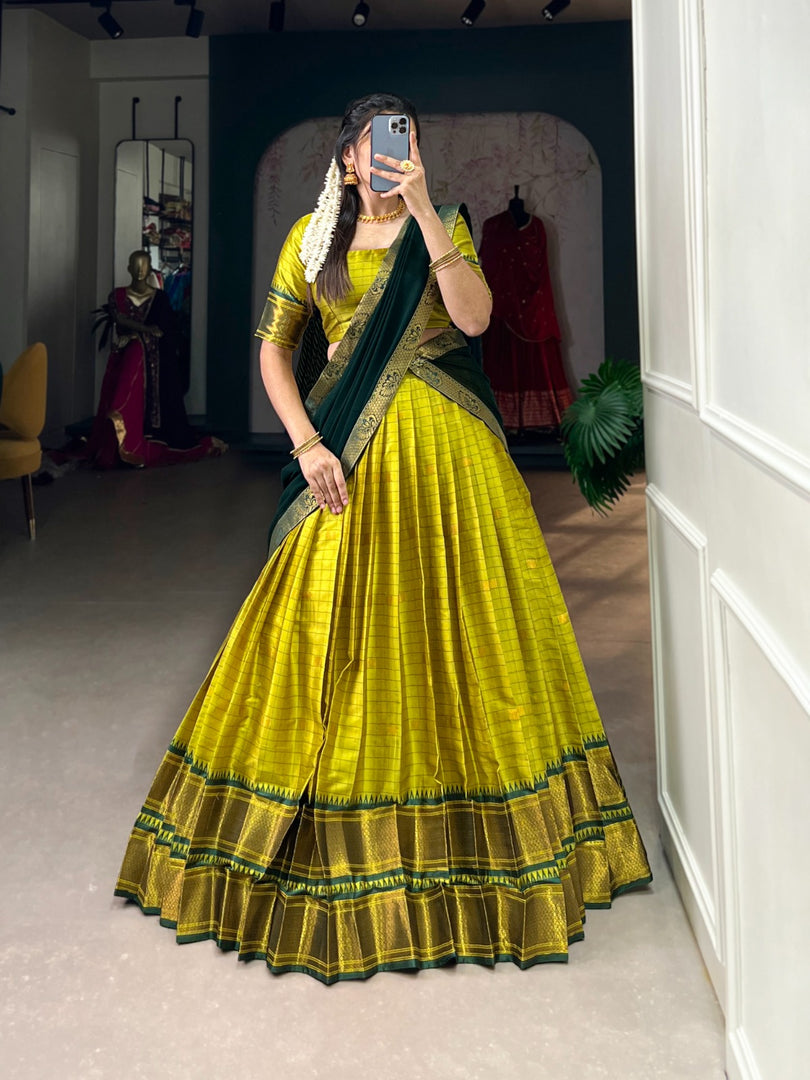 Traditional Cotton Silk Half-Saree with Paithani weaving. Features stitched lehenga , unstitched matching blouse, and decorated Georgette dupatta. Complete authentic ensemble combining comfort with cultural elegance.