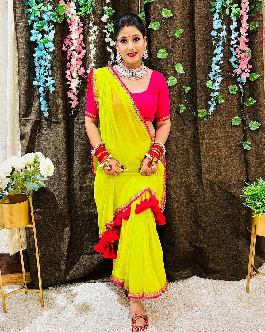 Yellow Georgette plain saree, 6.3m length. Includes matching blouse  -Shop Now Shoppers Trend.
