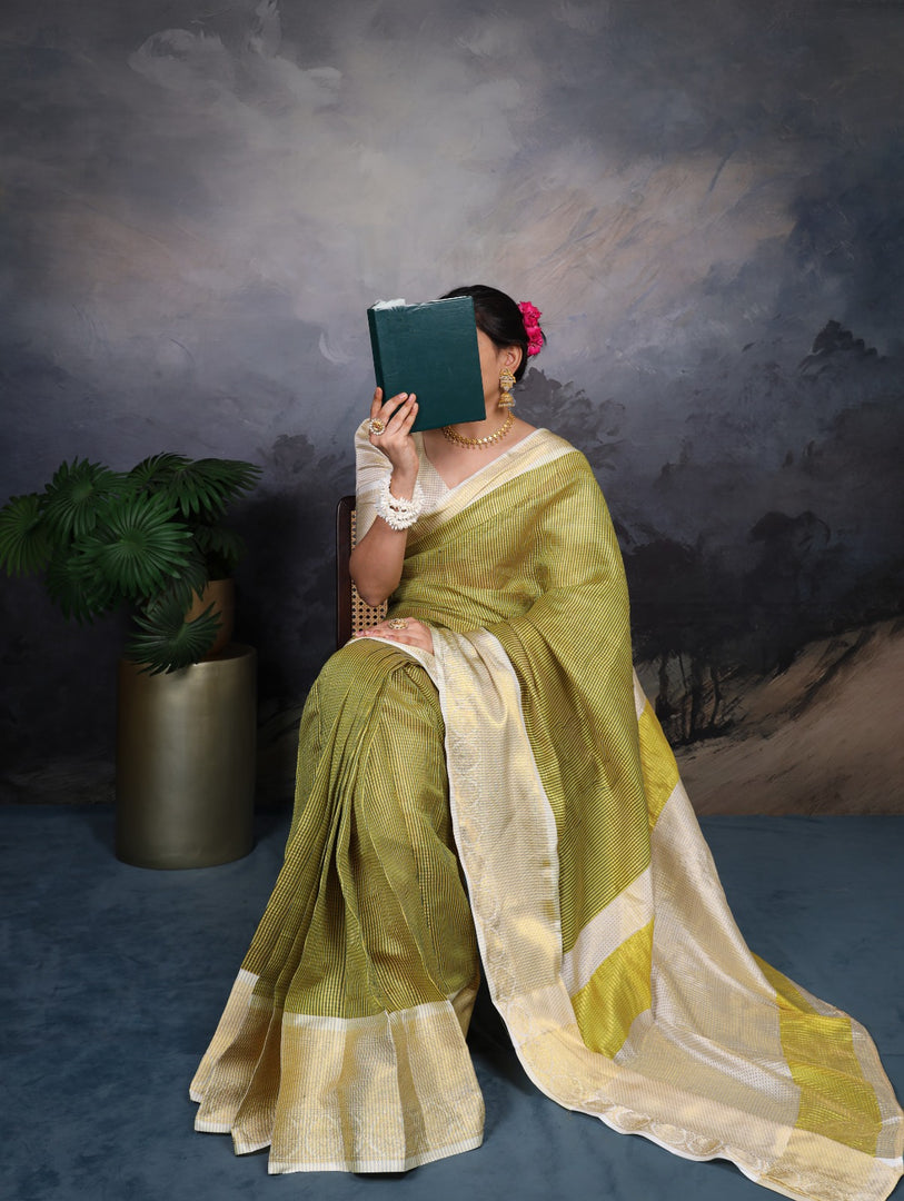 Parrot green jacquard saree , Parrot green zari weaving saree , Light green silk saree for women , Parrot color traditional saree , Chex pattern green saree . 