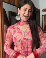 Load image into Gallery viewer, Peach Georgette Anarkali featuring floral print, V-neck, and full sleeves. 48-49&quot; length. Machine washable. Includes gown and dupatta.

