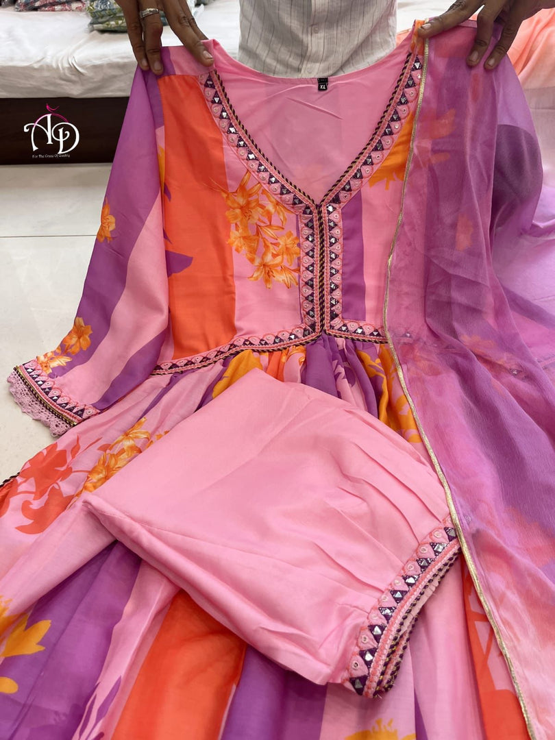Purple muslin gown with v-neck and full sleeves , Elegant purple ethnic dress with embroidery design , Stylish purple long Anarkali with graceful fall , Purple digital print Anarkali for festive fashion
Party wear purple Anarkali with dupatta included . 