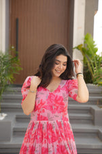 Load image into Gallery viewer, Peach or Pink Printed faux georgette gown (56&quot; length, 12m flair) with cotton lining, half sleeves and fancy V-neck. Fully stitched Gown , Traditional Look 2025-26 . 

