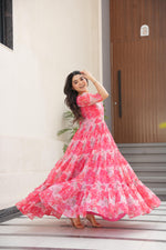 Load image into Gallery viewer, Party wear peach gown with floral prints , Soft peach designer gown with half sleeves , Wedding special peach printed gown for women , Floor-length peach georgette gown with cotton lining . 
