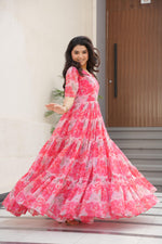 Load image into Gallery viewer, Peach or Pink Color Printed faux georgette gown with 56&quot; length, 12-meter flair, and full cotton lining. Features half sleeves and fancy V-neck. One complete stitched gown included.
