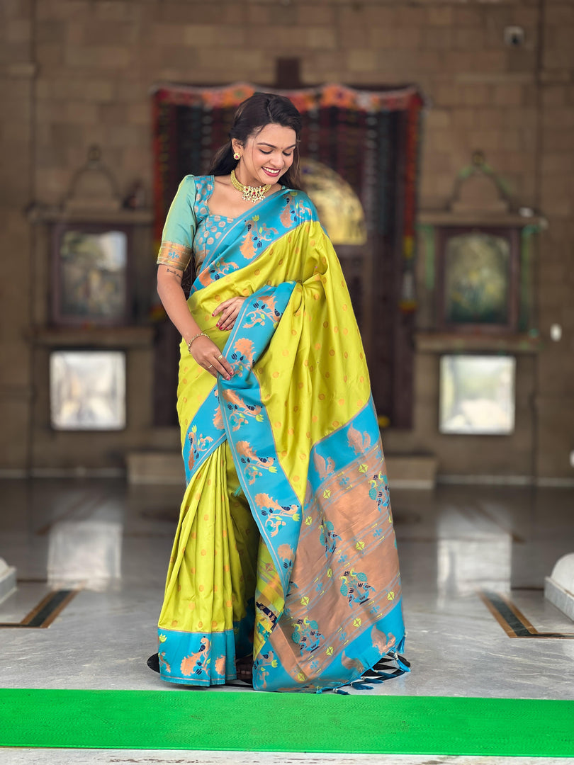 Perrot Soft Pethani SIlk Saree By Shoppers Trend . This Fabric Soft Pethani Silk Saree most Famous And RIch Fabric And WIth Light-Blue Border with Blouse Best Designer famous look.  