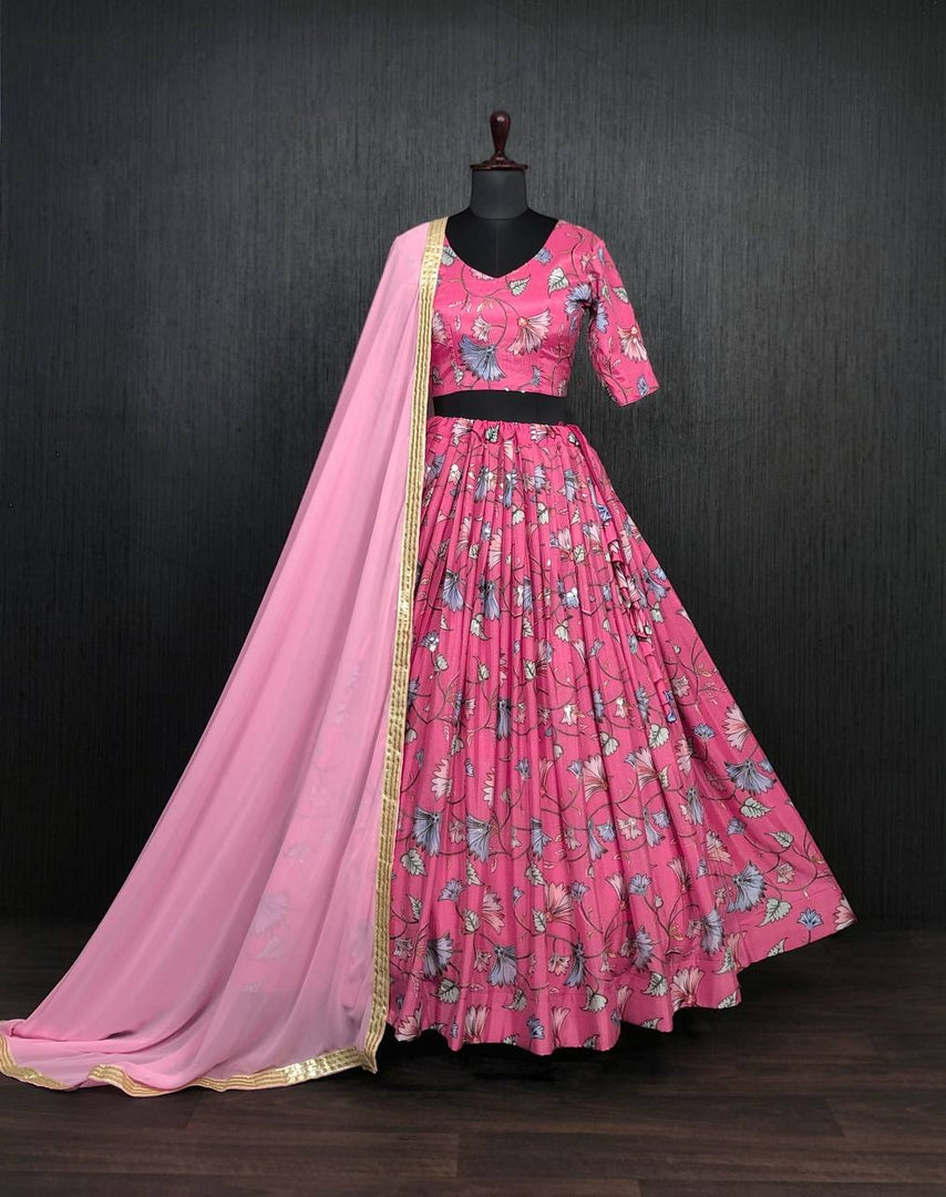 Pink Chinon Dhavani Set , Davani Set and Half-Saree With Price and Online Shopping Price Under 2000 . This Printed With Position Print Dhavani Set features printing and a drawstring with heavy tassels and zip. The set also includes a stitched canvas and attached Can , an Unstitched blouse with Position printing, a Dupatta, and Printed With Both Side Tassels . Traditional Look For 2024-25, 2025-26 .
