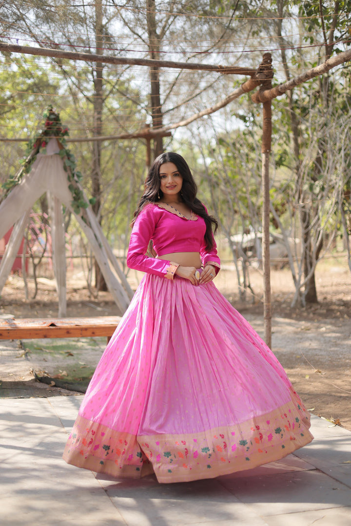 Pure pink lehenga set with full-sleeved phantom blouse , Pink bridal lehenga with zari lace and V-neck blouse , Comfortable pink lehenga with canvas stitched finish , Traditional pink lehenga in Dayble viscose fabric , Pink partywear lehenga with rich ethnic embroidery . 