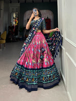 Load image into Gallery viewer, Pink Color With Navy Blue Langa Voni With Tussar Silk Dhavani Set | Langa Voni | Davani Set With Price and Online Shopping Price Under 2000 . this Fabric Pink Tussar Silk Dhavani Set Best For Weddings Best Choise Price ,  Enhance your ethnic look with this stunning Tussar Silk lehenga set. Includes a stitched lehenga, blouse, and Dupatta with Pichwai With Patola Print and elegant lace touch-ups . Traditional Look For 2024-25 , 2025-26 .
