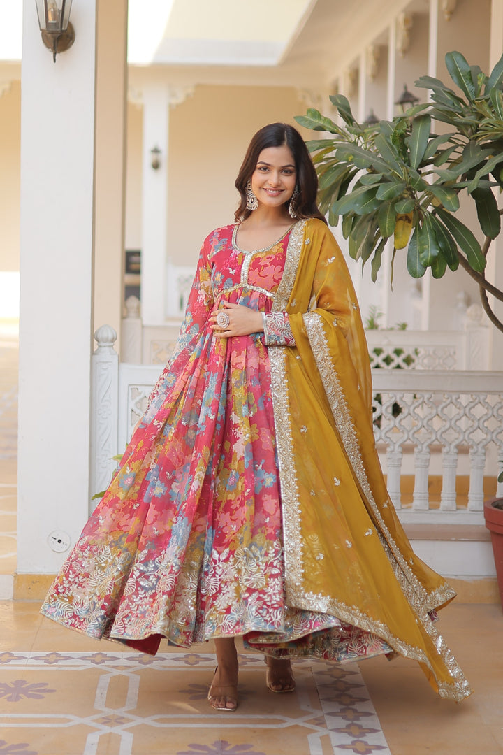 Pink Color Russian Silk Outfit Russian Silk Designer Outfit – Embroidered Top & Dupatta With Price and Online Shopping Price Under 2000 . Stylish digital printed Russian silk top with embroidery, zari sequins work, and cut-work dupatta. Full sleeves, 53-inch length, cotton lining. Perfect for festive wear . 