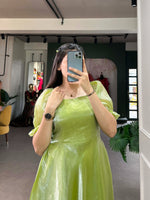 Load image into Gallery viewer, This stitched frock is made from Burberry silk with a plain design. It features a 40&quot; chest (adjustable up to 42&quot;), 38&quot; waist, 47&quot; length, and 4 meters of flair. The sleeves are 12&quot; long, and it is fully lined with micro cotton for comfort.
