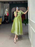 Load image into Gallery viewer, Soft pista green frock in premium Burberry silk , Pista color frock with plain elegant design , Stylish pista frock for festive and formal events , Pista silk frock with 4-meter flair and lining , Simple yet classy pista Burberry silk frock , Designer pista frock for women with comfort fit .
