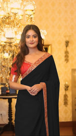 Load image into Gallery viewer, Premium Heavy Georgette Saree with Handcrafted Butti &amp; Moti Work – Perfect for Weddings &amp; Parties Saree Premium Heavy Georgette – soft, flowy &amp; elegant and Blouse Luxurious Mono Thai Silk Ideal for weddings, festivals &amp; parties . 
