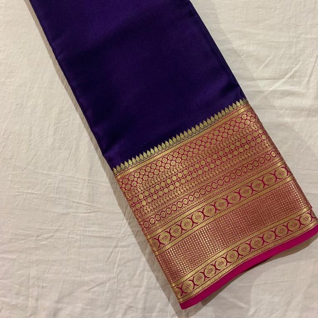 Navy Blue Semi-Mysore Silk Saree price online shopping under 1000 . 
This Color Semi-Mysore Silk Saree With Gold Zari Weaving Work and rani Pattu For Weddings and So look Mainly ,Manufacturing in Mysore District in Karnataka, India.   