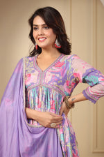 Load image into Gallery viewer, This purple Anarkali set features a cotton maslin fabric with digital shine print and embroidery. It includes a gown, pant, and dupatta, with a V-neck and full sleeves. The length is 52-55 inches. Easy to care for with machine wash. Available in size S/M/L/XL/2XL/3XL . 
